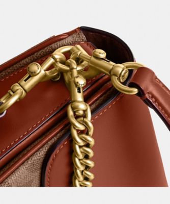 キャシー クロスボディ バッグ 19・シグネチャー キャンバス